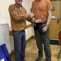 Chairman, David Silk presents Colin Miller with his award